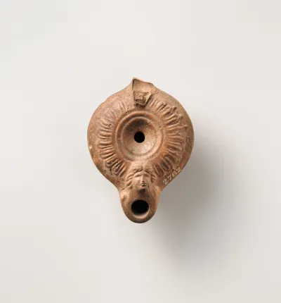 Terracotta oil lamp