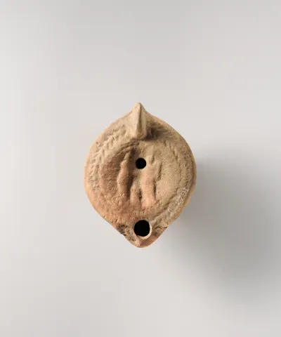 Terracotta oil lamp