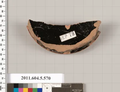 Terracotta fragment of a stemless kylix (drinking cup)