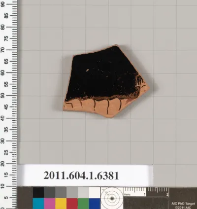 Terracotta fragment of a kylix (drinking cup)