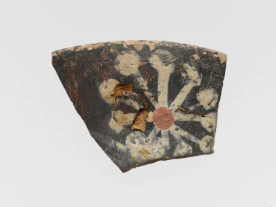 Terracotta rim of a cup with rosette