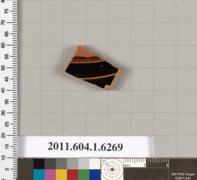 Terracotta fragment of a kylix (drinking cup)