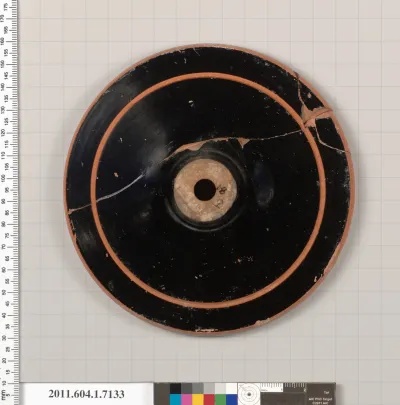 Terracotta fragment of a kylix (drinking cup)