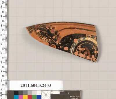 Terracotta rim fragment of a kylix: eye-cup (drinking cup)