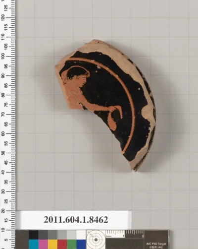 Terracotta fragment of a stemless kylix (drinking cup)
