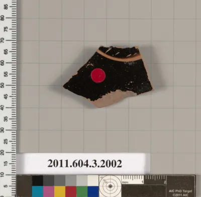 Terracotta fragment of a kylix (drinking cup)