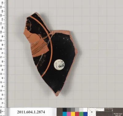 Terracotta fragment of a kylix (drinking cup)