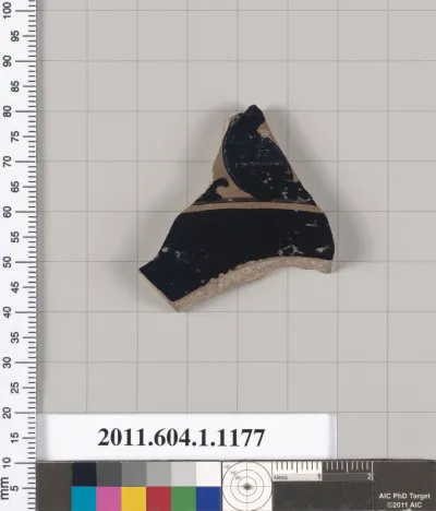 Terracotta fragment of a kylix (drinking cup)