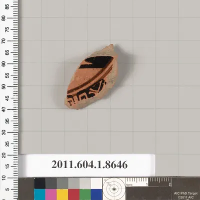 Terracotta fragment of a stemless kylix (drinking cup)