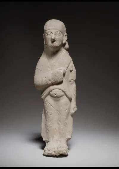 Standing female figurine