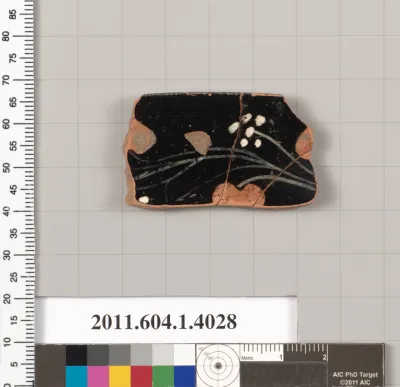 Terracotta fragment of a kylix (drinking cup)