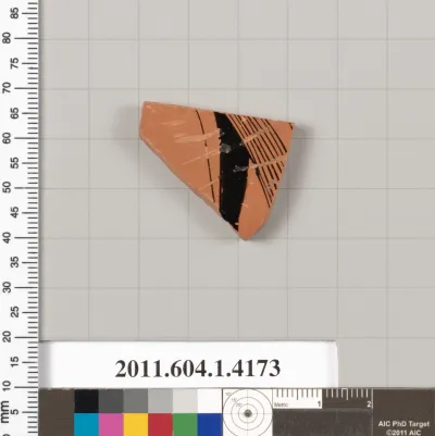 Terracotta fragment of a kylix (drinking cup)