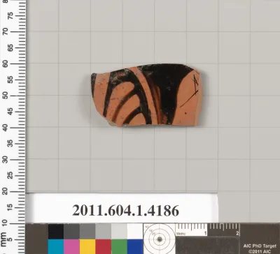 Terracotta fragment of a kylix (drinking cup)