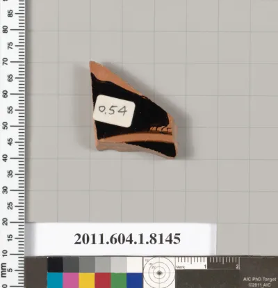 Terracotta fragment of a kylix (drinking cup)