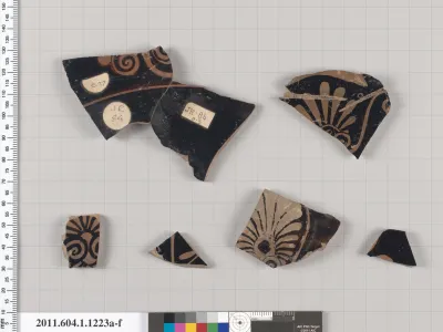 Terracotta fragments of kylikes (drinking cups)