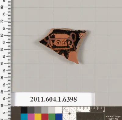 Terracotta fragment of a kylix (drinking cup)