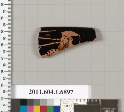 Terracotta rim fragment of a kylix (drinking cup)