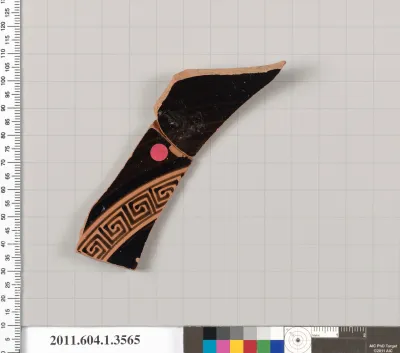 Terracotta fragment of a kylix (drinking cup)