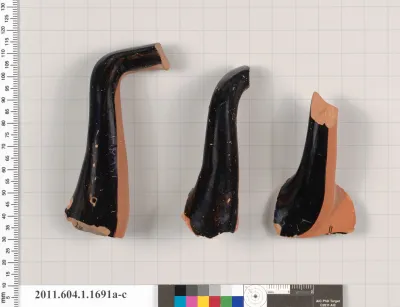 Terracotta fragments of kylikes (drinking cups)