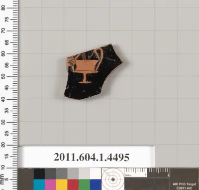 Terracotta fragment of a kylix (drinking cup)