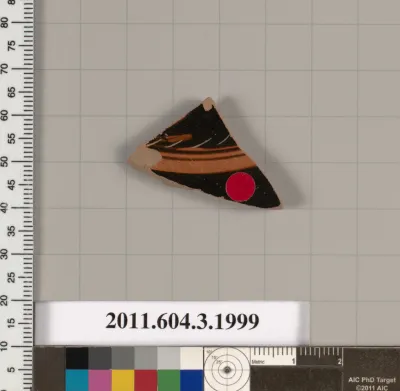 Terracotta fragment of a kylix (drinking cup)
