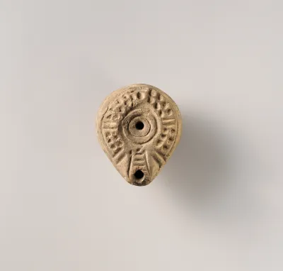 Terracotta oil lamp