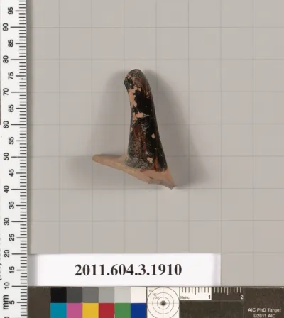 Terracotta fragment of a kylix (drinking cup) or a skyphos (deep drinking cup)?