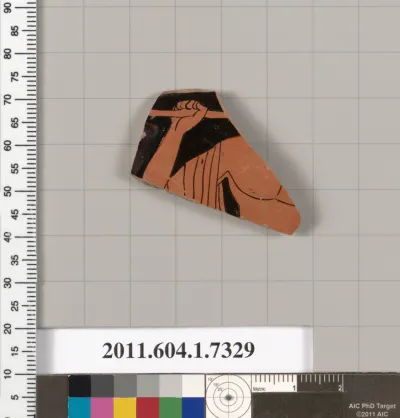 Terracotta rim fragment of a kylix (drinking cup)