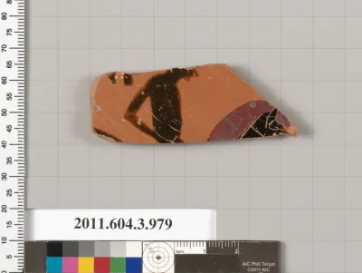 Terracotta fragment of a lekanis lid (covered dish)