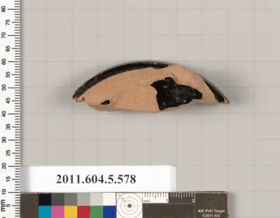 Terracotta fragment of a stemless kylix (drinking cup)