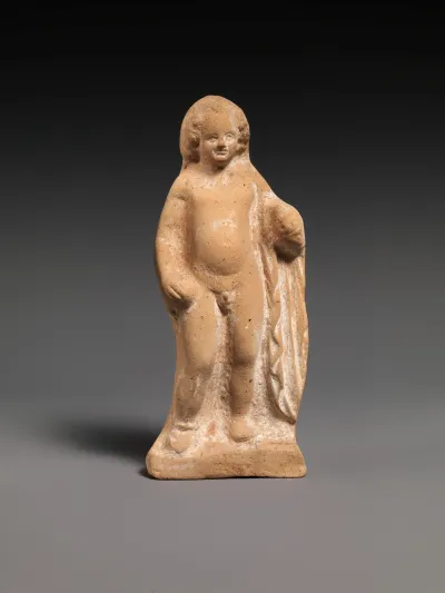 Terracotta statue of Eros holding an apple