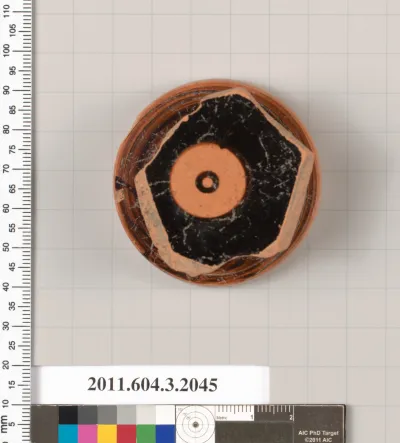 Terracotta fragment of a stemless kylix (drinking cup)