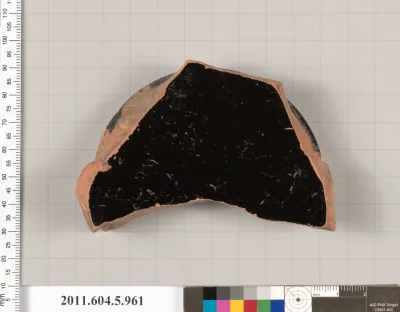 Terracotta fragment of a stemless kylix (drinking cup)