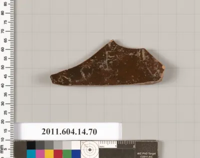 Terracotta fragment of a kylix (drinking cup)