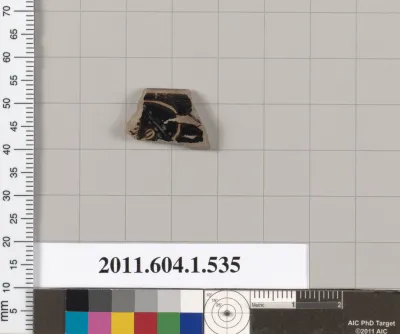 Terracotta rim fragment of a kylix (drinking cup)