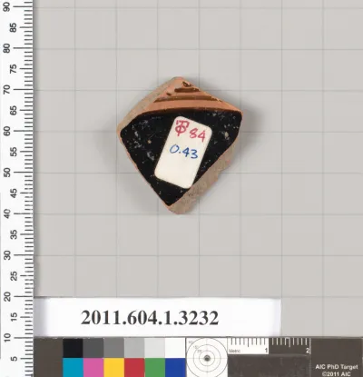 Terracotta fragment of a kylix (drinking cup)