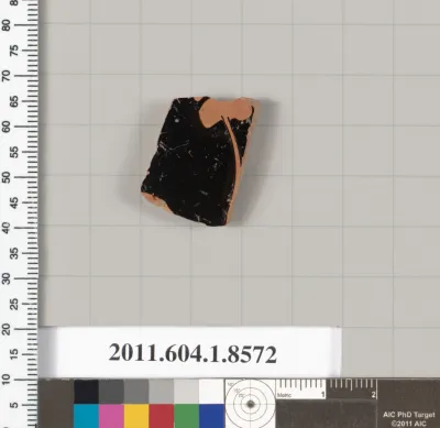 Terracotta fragment of a stemless kylix (drinking cup)