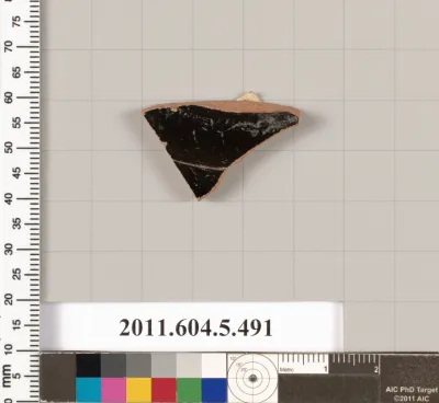 Terracotta fragment of a kylix (drinking cup)