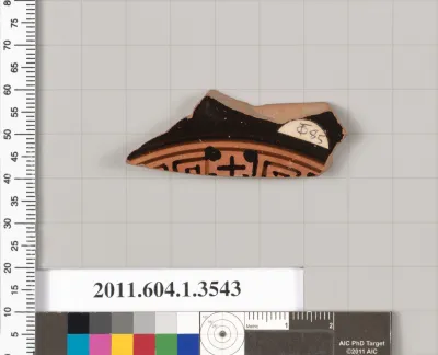 Terracotta fragment of a kylix (drinking cup)