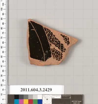 Terracotta fragment of a kylix (drinking cup)