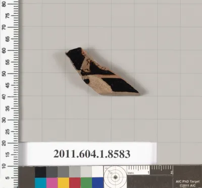 Terracotta fragment of a stemless kylix (drinking cup)