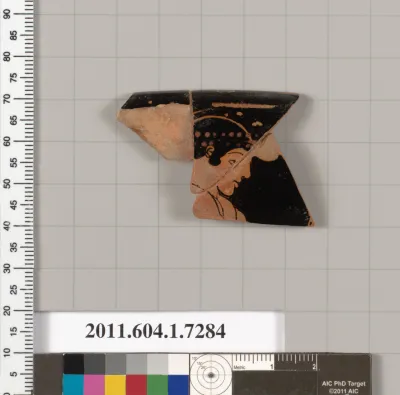 Terracotta rim fragment of a kylix (drinking cup)