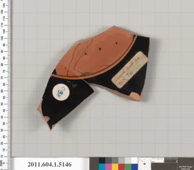 Terracotta fragment of a kylix (drinking cup)