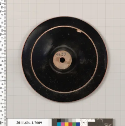 Terracotta fragment of a kylix (drinking cup)