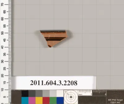 Terracotta fragment of a kylix (drinking cup)