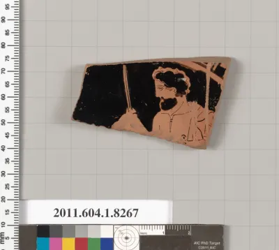 Terracotta fragment of a kylix (drinking cup)