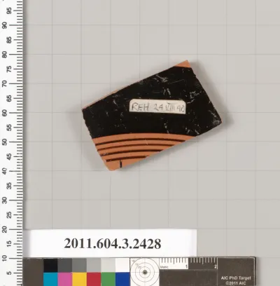 Terracotta fragment of a kylix: eye-cup (drinking cup)