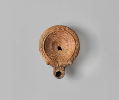 Terracotta oil lamp
