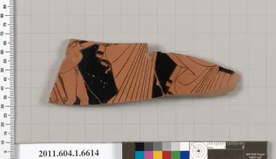 Terracotta fragment of a kylix (drinking cup)