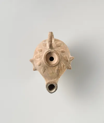 Terracotta oil lamp